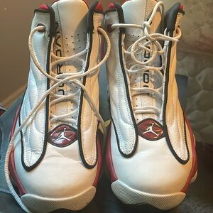 Size 7 red, white, and black used Jordan shoes.